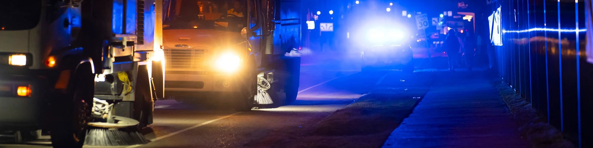 Street Sweepers At Night